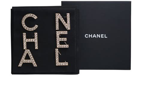 chanel brooch letter|Chanel brooch number 5.